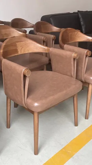 China Factory Direct Supply Nordic Modern Designer Armrest Dining Chair Hotel Lobby Lounge Chair Leather Solid Wood Frame Upholstered Dining Room Chair 
